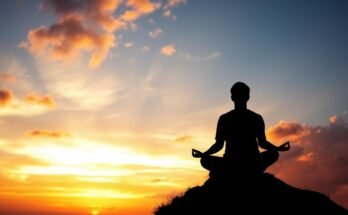 Osoba medytująca na tle zachodu słońca, symbolizująca duchową podróż i jak sprawdzić swój poziom duchowy